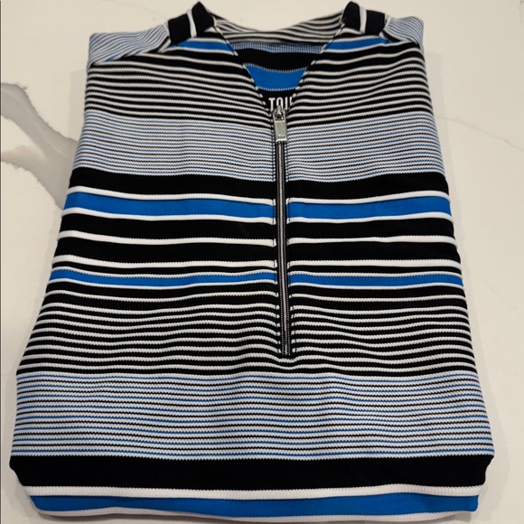 Tail Women's Cindy Sleeveless Golf Top
Striped Sleeveless Top - Blue and Black S - Picture 9 of 9